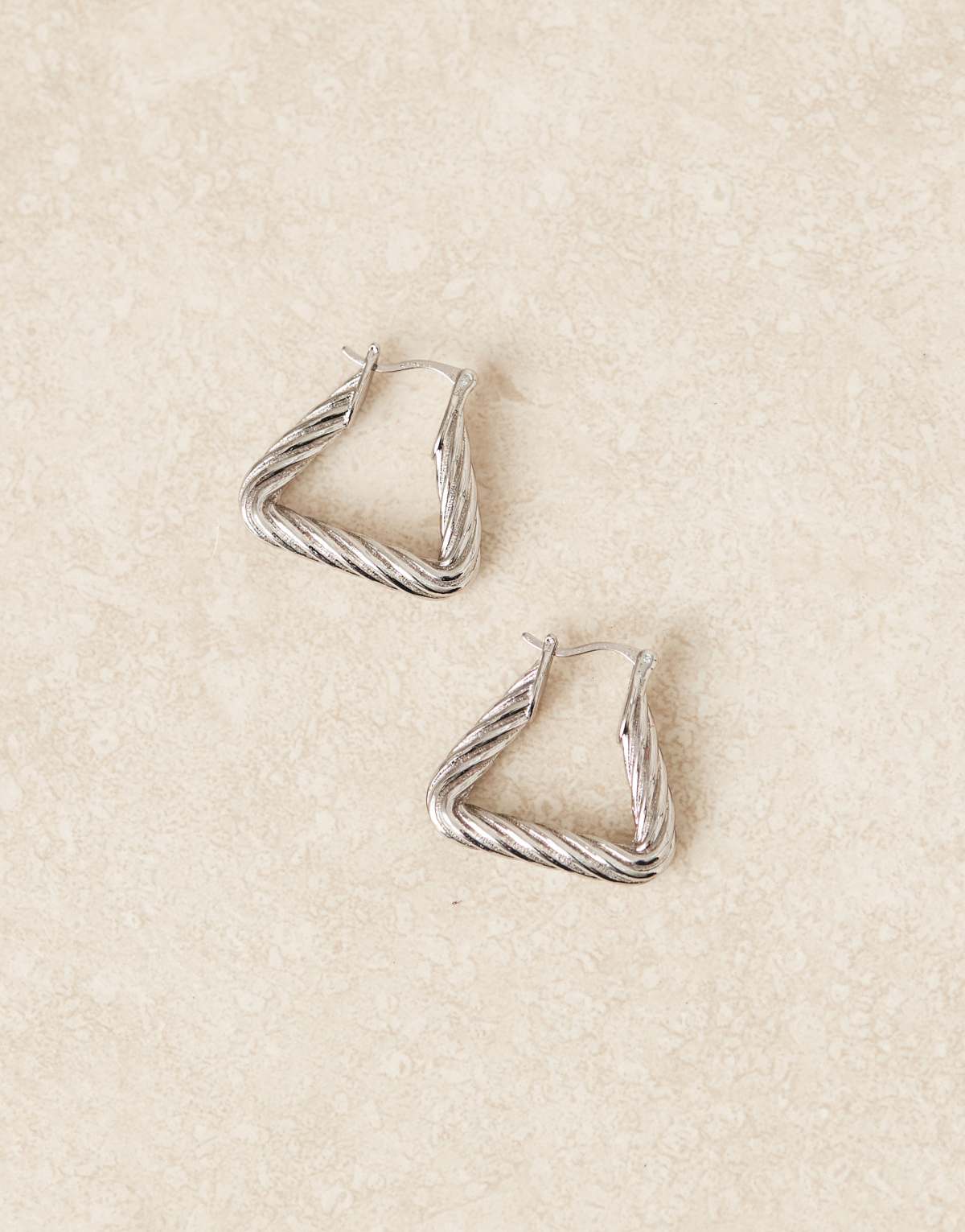 ASOS DESIGN triangular hoop earrings with twist detail in silver tone