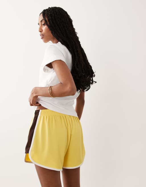 ASOS DESIGN - Tricot hardloopshort met biezen in lichtgeel, 5 van 5