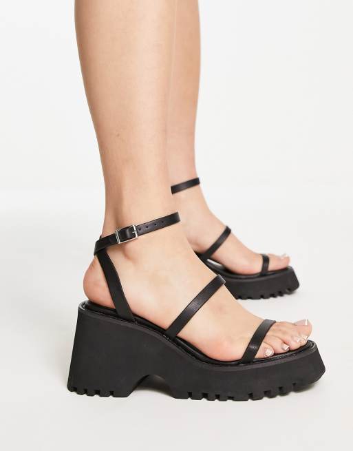 ASOS DESIGN Trip triple strap chunky cleated sandals in black ASOS