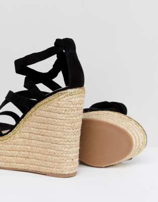 asos design trophy tie leg high wedges