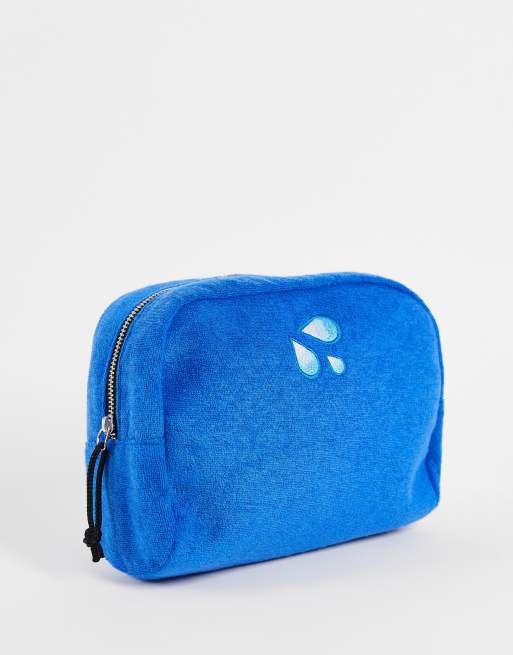 ASOS DESIGN - Trousse de toilette texturée à broderie - Bleu