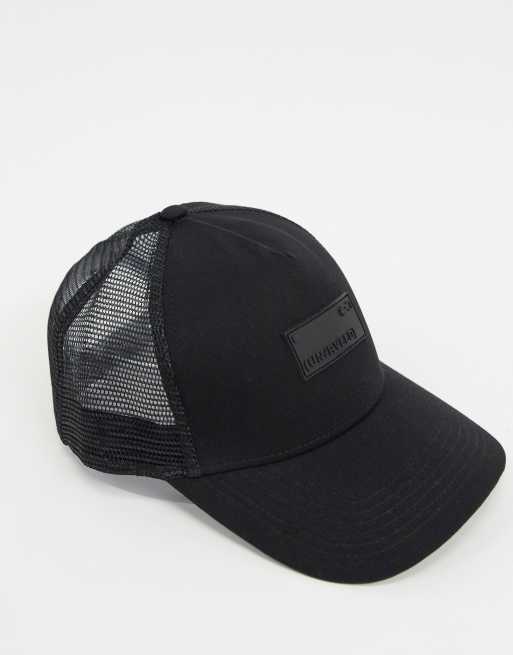 ASOS DESIGN trucker cap with rubber branding in black