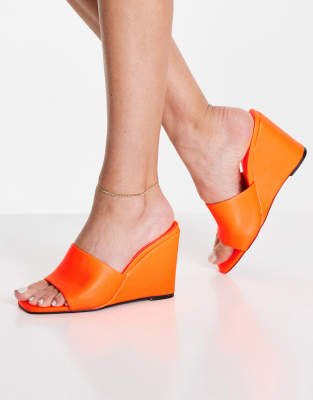 ASOS DESIGN True high wedge mules in orange