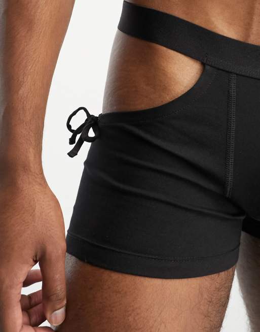 ASOS DESIGN trunks in black with cut outs and tie side | ASOS
