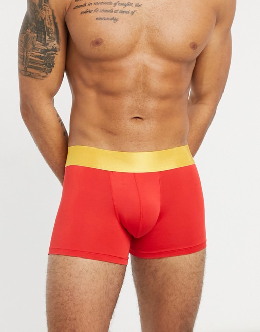 ASOS DESIGN  trunks in red microfiber with gold waistband