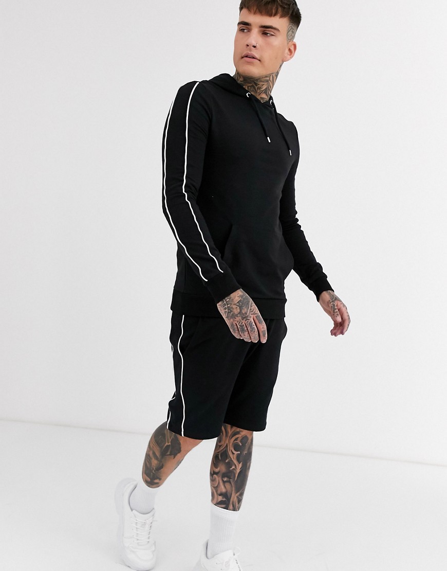 ASOS DESIGN tætsiddende joggingsæt med hættetrøje/shorts og kantdetaljer i sort