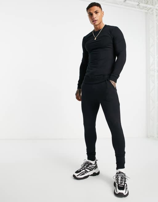 ASOS DESIGN - Tætsiddende træningsdragt i sort - BLACK