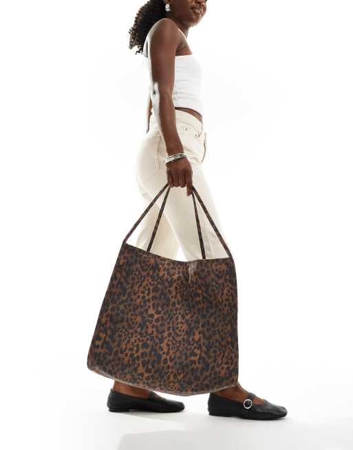 ASOS DESIGN tubular handle canvas tote bag in brown leopard