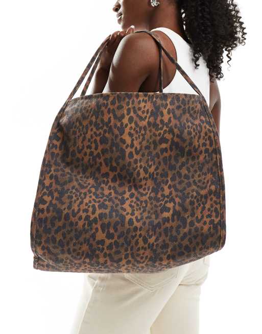 ASOS DESIGN tubular handle canvas tote bag in brown leopard ASOS