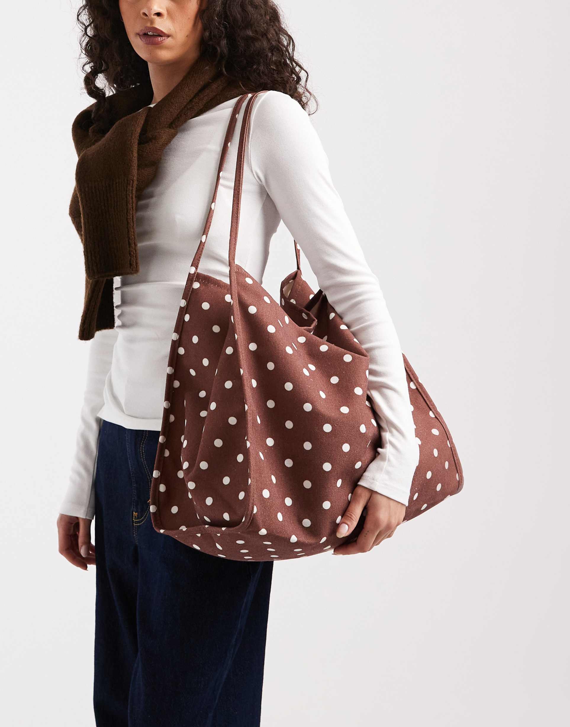 asos design tubular handle canvas tote in polka dot print