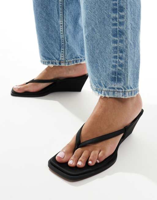 ASOS DESIGN Tulum Sandali infradito con zeppa neri ASOS