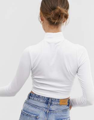 tight white turtleneck top