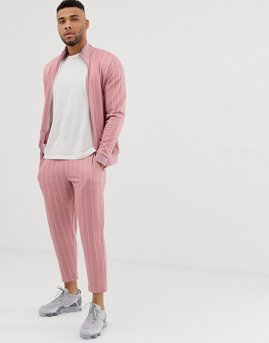 ASOS DESIGN - Tuta con giacca sportiva/joggers cropped rosa gessati affusolati