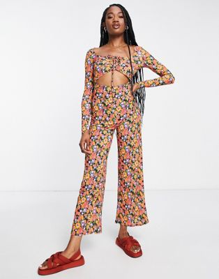 ASOS DESIGN cut-out lace-up jumpsuit in floral print - ASOS Price Checker