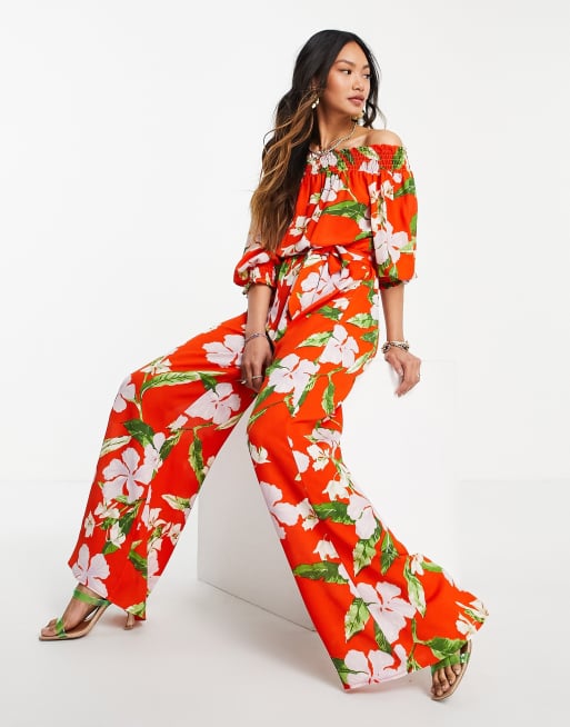ASOS DESIGN - Tuta jumpsuit a fondo ampio con scollo Bardot in tessuto stropicciato arancione a fiori