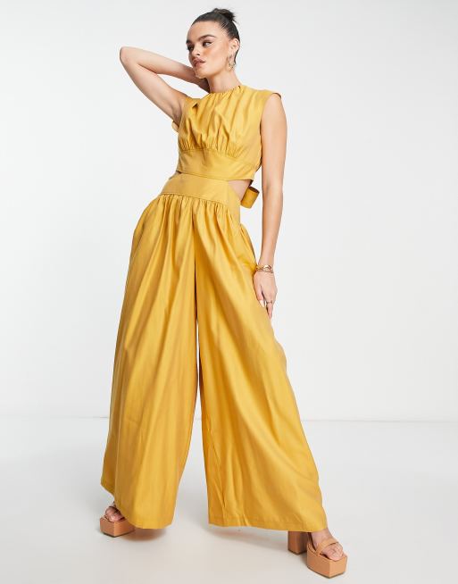 ASOS DESIGN - Tuta jumpsuit con corpetto stile blusa con cut-out color senape a fondo ampio