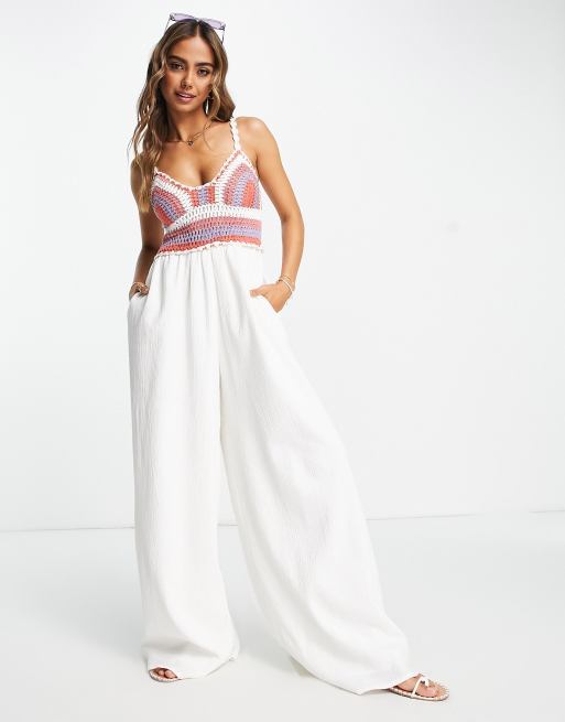 ASOS DESIGN - Tuta jumpsuit increspata con corpetto in maglia all'uncinetto e fascette color crema