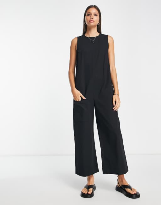 ASOS DESIGN - Tuta jumpsuit minimal senza maniche nera in twill con tasche, 4 di 4