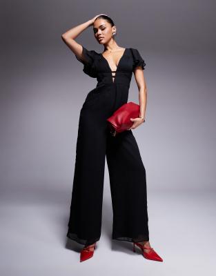 ASOS DESIGN - Tuta jumpsuit nera a fondo ampio con manica con volant arricciata - view 1