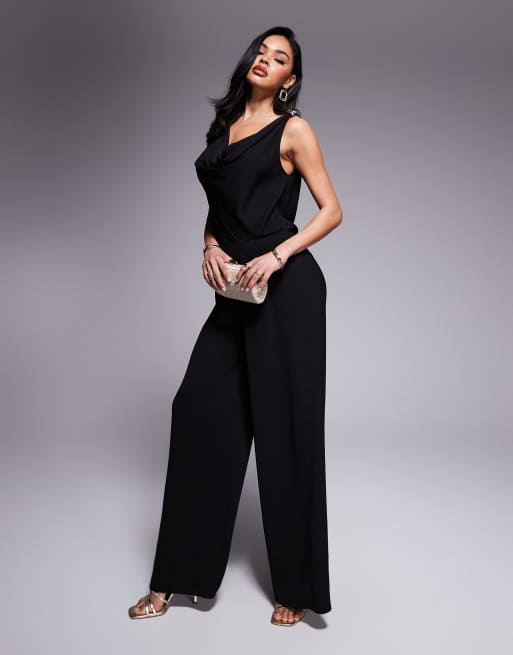 ASOS DESIGN - Tuta jumpsuit nera a fondo ampio con scollo ad anello e dettagli in metallo tonalità oro