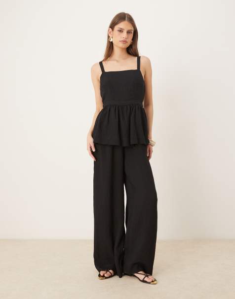 ASOS DESIGN - Tuta jumpsuit nera con peplo in vita - view 1