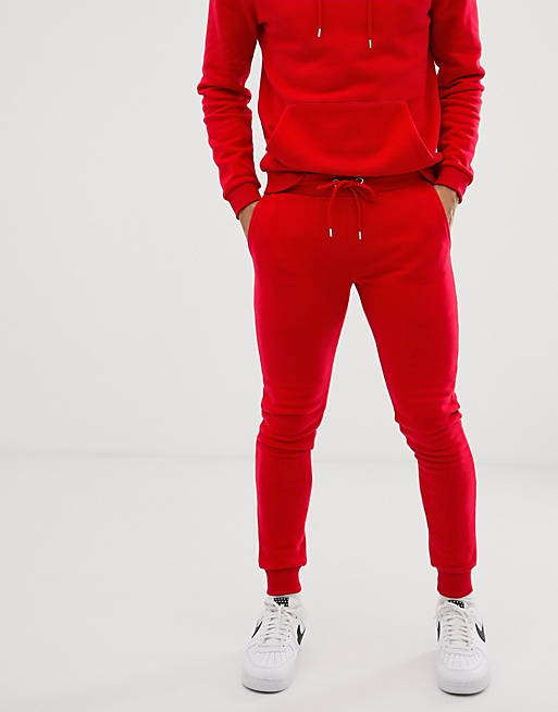 ASOS DESIGN - Tuta rossa con felpa con cappuccio/joggers skinny