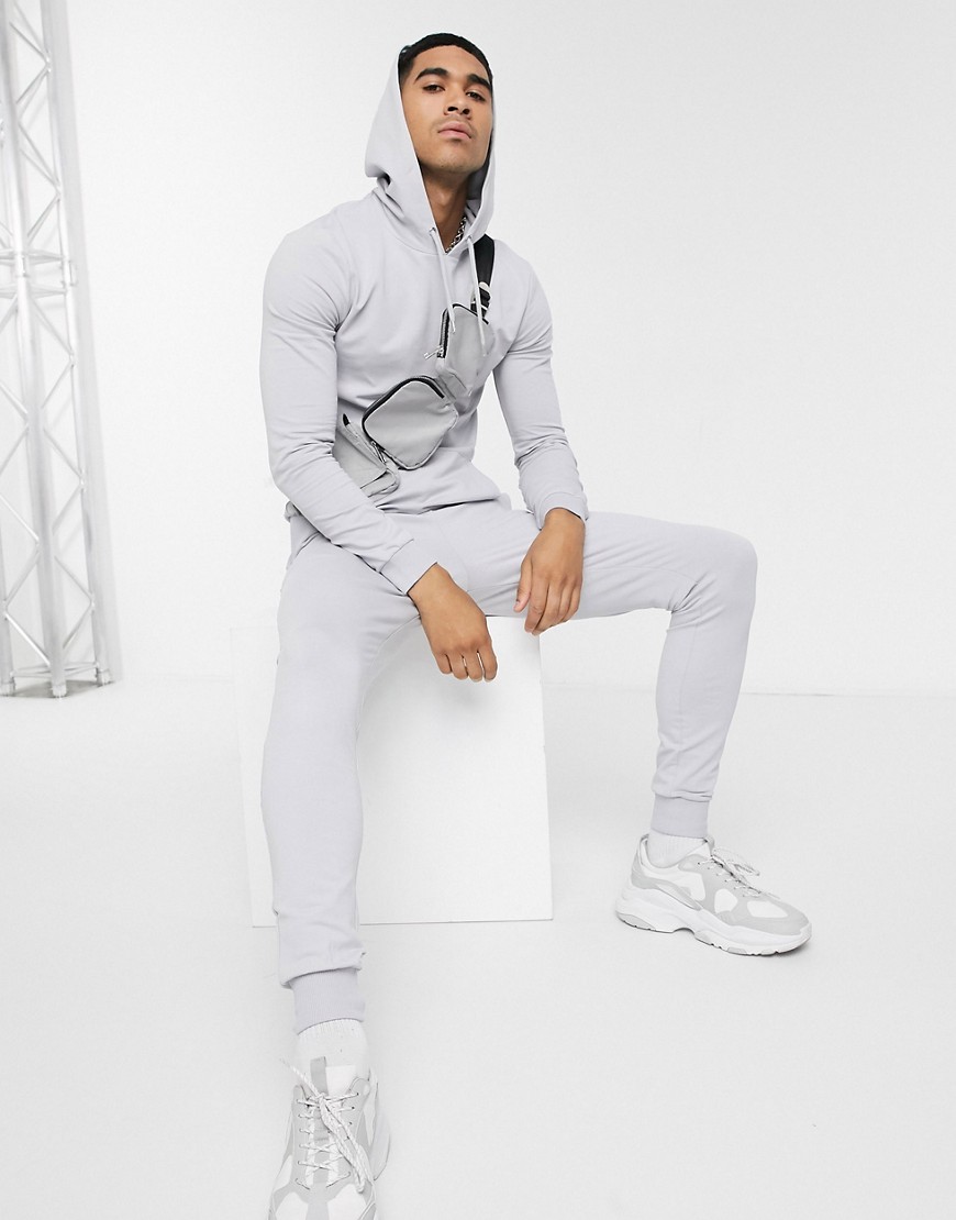 ASOS DESIGN - Tuta sportiva attillata grigio chiaro composta da felpa con cappuccio