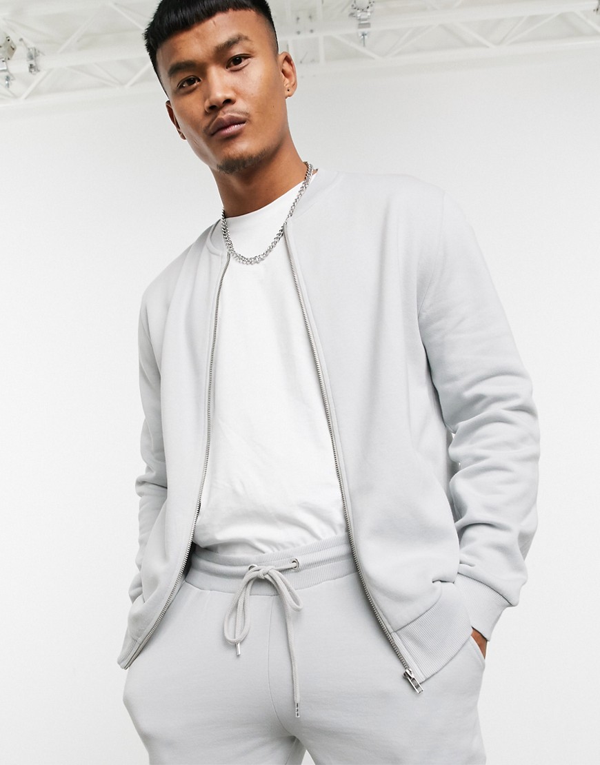ASOS DESIGN - Tuta sportiva grigio chiara con giacca stile bomber