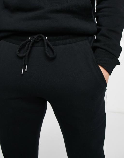 ASOS DESIGN - Tuta sportiva nera con riga laterale, 3 di 4