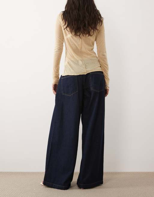 ASOS DESIGN – Tvättade jeans med vida ben och veckdetaljer, 2 av 5