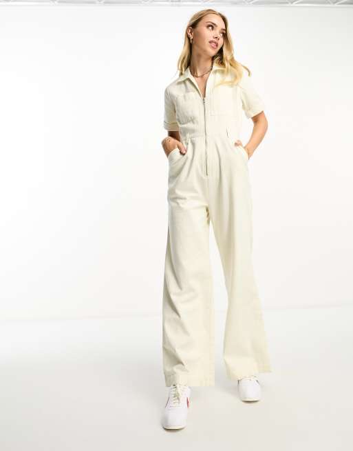 ASOS Studio Happy ASOS DESIGN twill retro monogram kick flare jumpsuit in  brown - ShopStyle