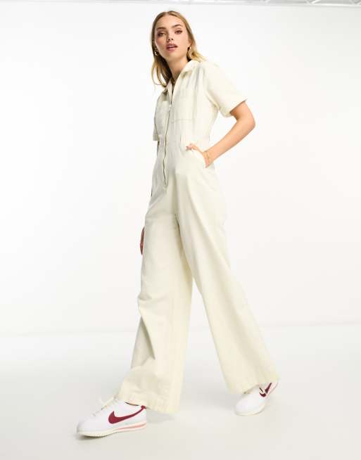 ASOS Studio Happy ASOS DESIGN twill retro monogram kick flare jumpsuit in  brown - ShopStyle