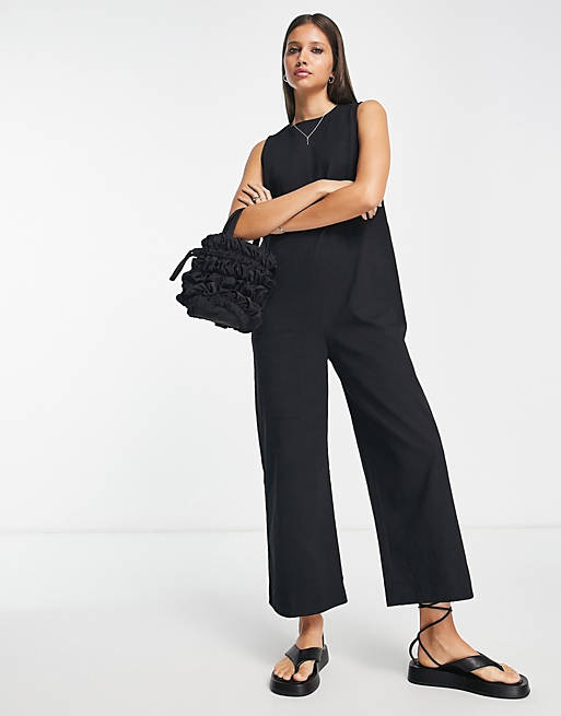 ASOS DESIGN twill minimal sleeveless jumpsuit with pockets in black | ASOS
