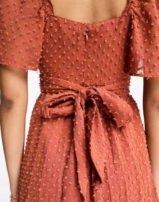 ASOS DESIGN twist front angel sleeve dobby midi dress in dark rust