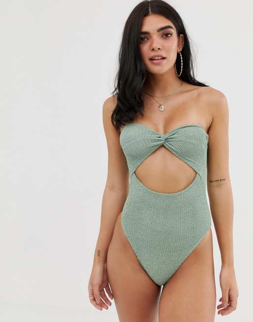 ASOS DESIGN twist front bandeau crinkle swimsuit in shiny green ASOS