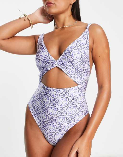 ASOS DESIGN twist front cut out swimsuit in blue tile print