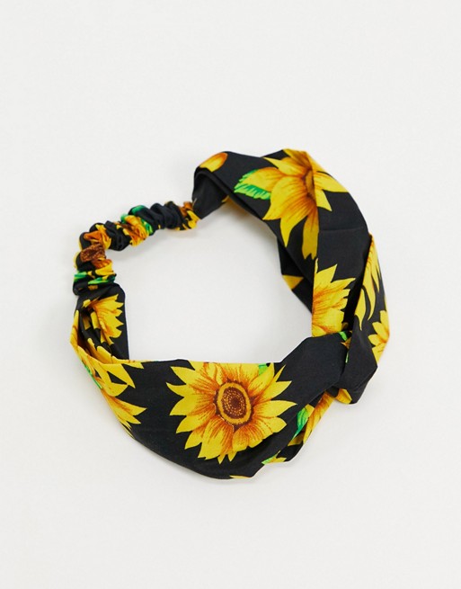ASOS DESIGN twist front headband in sunflower print in black