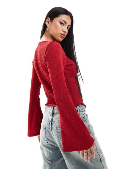 ASOS DESIGN twist front long sleeve flute top in red | ASOS