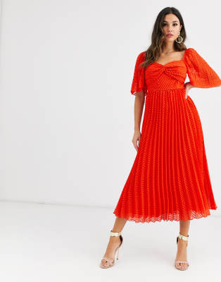 red pleated dress with sleeves