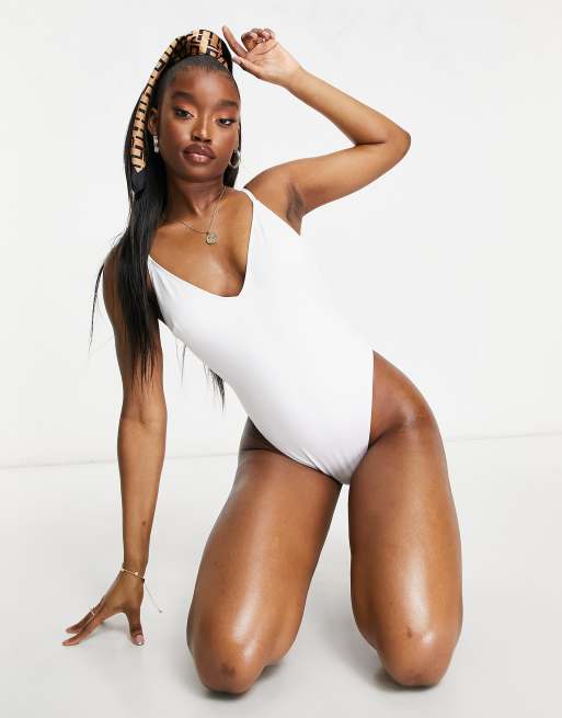 ASOS DESIGN twist strappy low back swimsuit in white