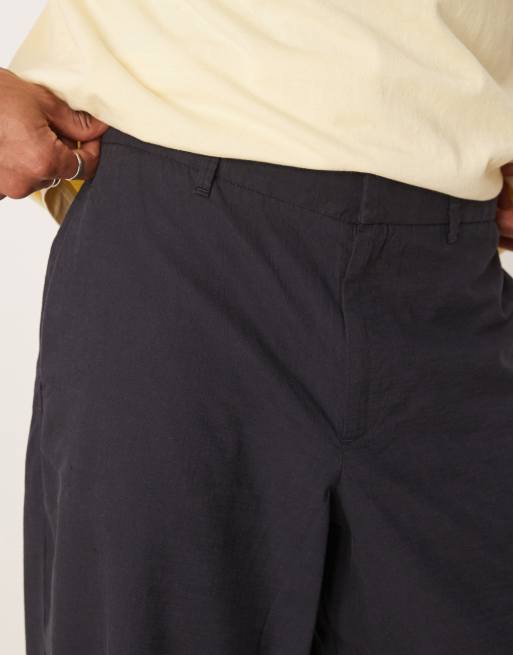 ASOS DESIGN twisted horseshoe pants in black