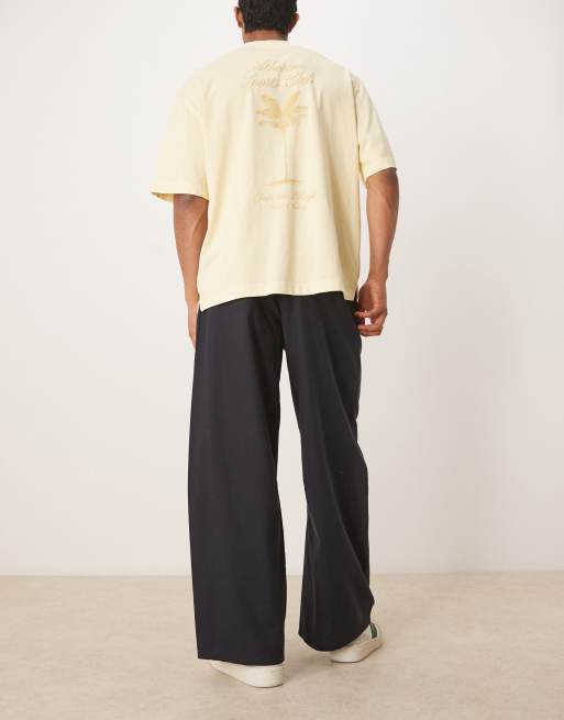 ASOS DESIGN twisted horseshoe pants in black
