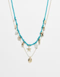 [ASOS DESIGN] ASOS DESIGN two-pack of blue cord and gold tone chain necklaces with sea-life charms No Size Blue And Gold