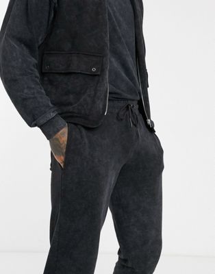 ASOS DESIGN two-piece oversized sweatpants in black acid wash