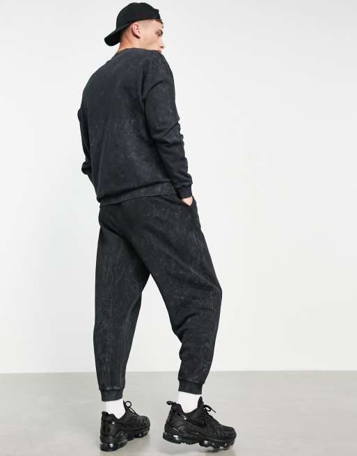 ASOS DESIGN two-piece oversized sweatpants in black acid wash