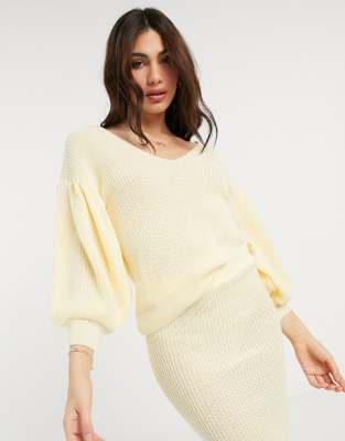 light yellow sweater