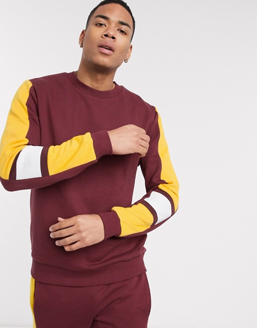 ASOS DESIGN two-piece sweatshirt in burgundy with mustard & white side ...