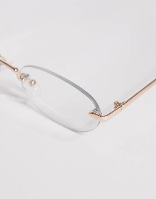ASOS DESIGN - Uindfattede briller med guldfarvet metalstel og klare glas, 2 af 3