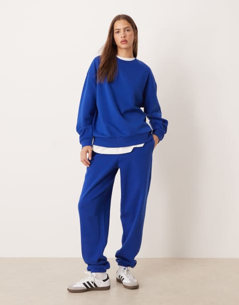 ASOS DESIGN ultimate cuffed brushback trackies in deep blue - view 1