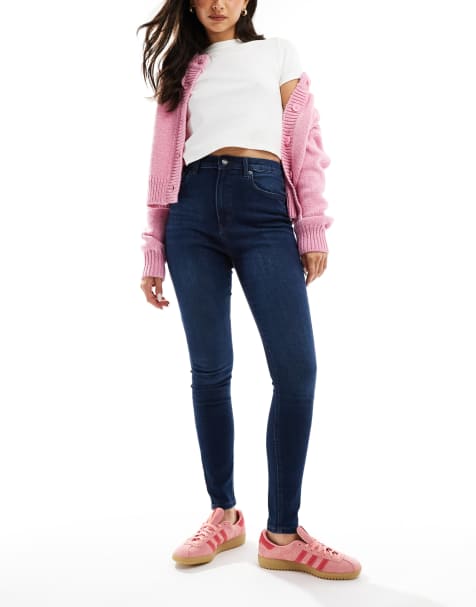 ASOS DESIGN – Ultimate – Eng geschnittene Jeans in Dunkelblau - view 1